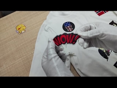 Remendos bordados feitos sob encomenda da letra do crânio com revestimento protetor do esparadrapo da beira de Merrow