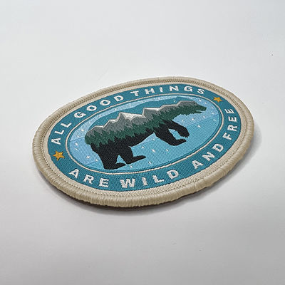 Velcro que suporta o ferro animal na beira tecida da cor 12C Merrow de Pantone do poliéster do remendo
